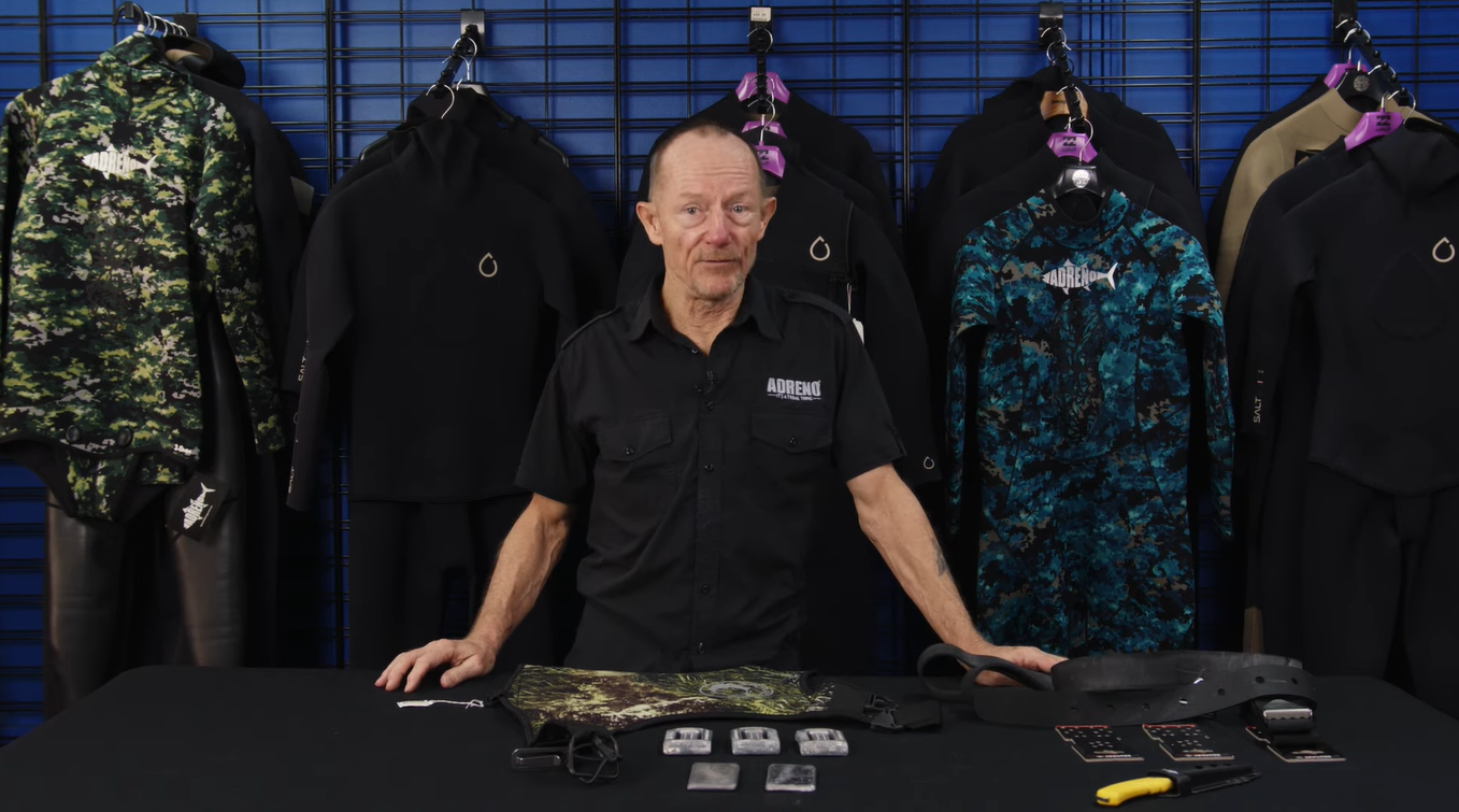 speaker discussing about diving weight vest