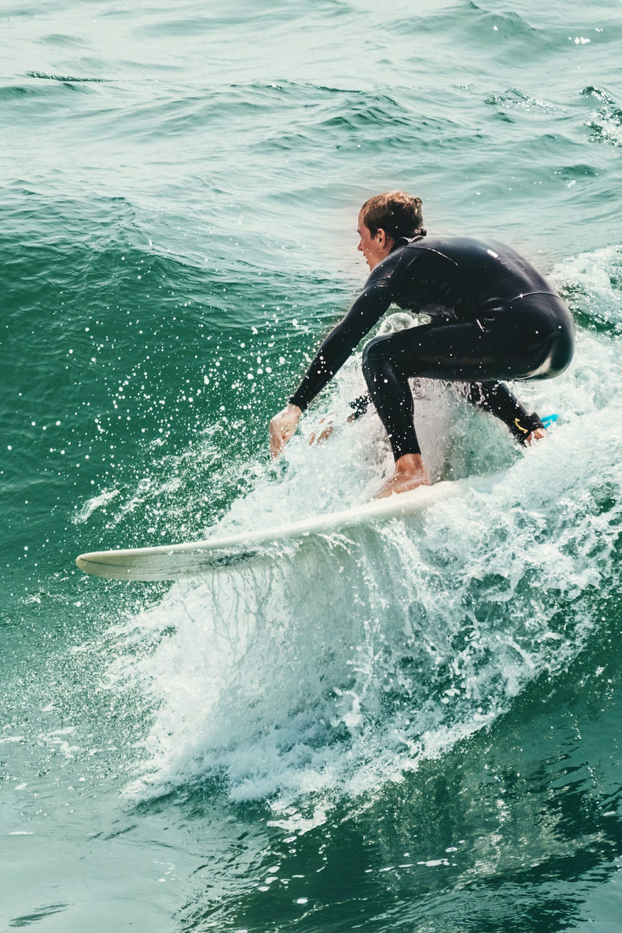 Surfing wetsuit tops and vests