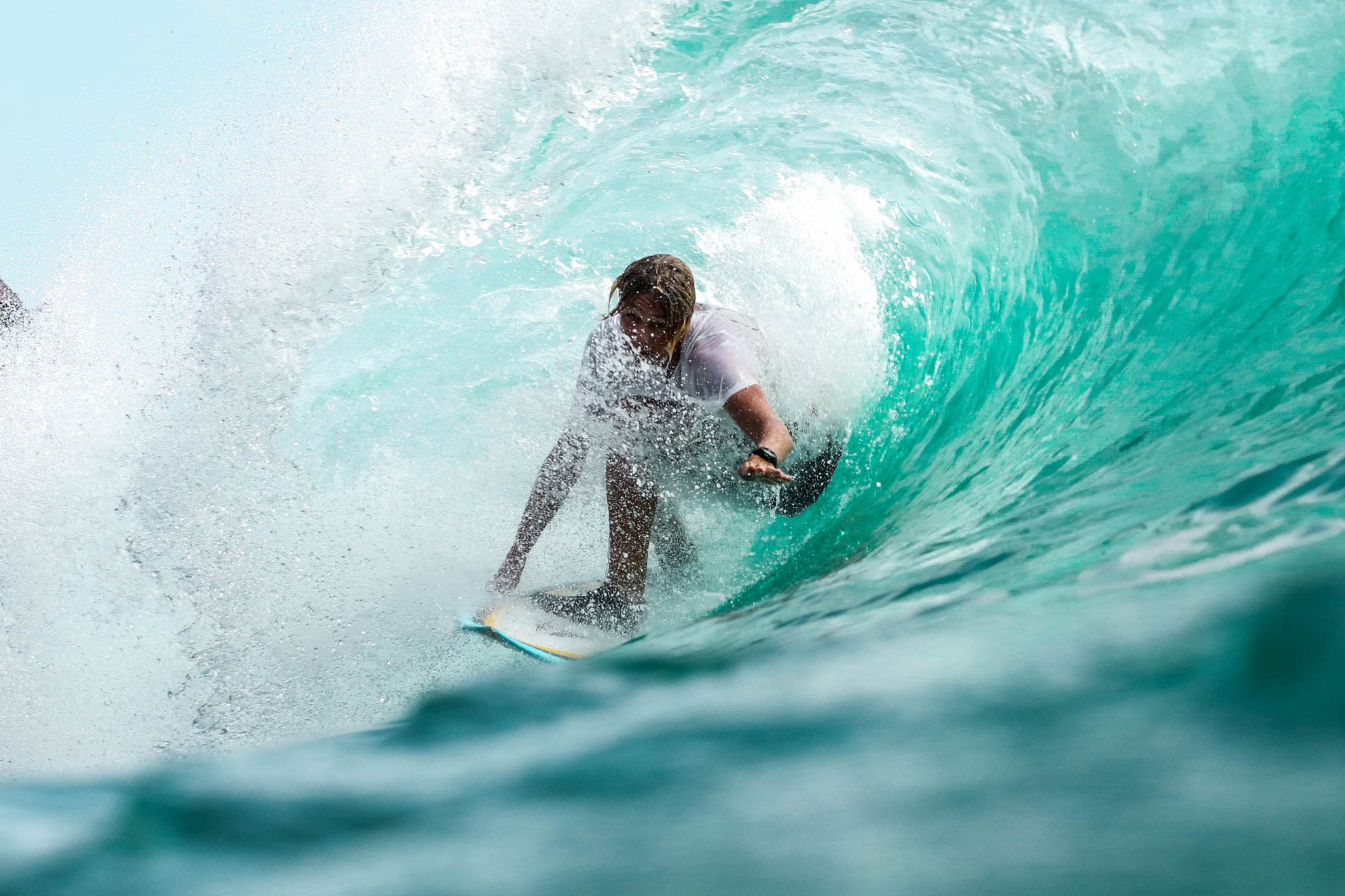 Surfer riding a wave in Australian coastal waters